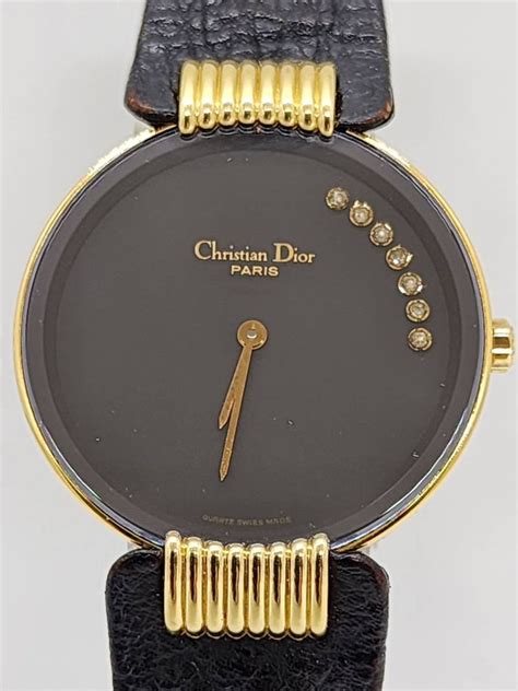 christian dior plaque or g